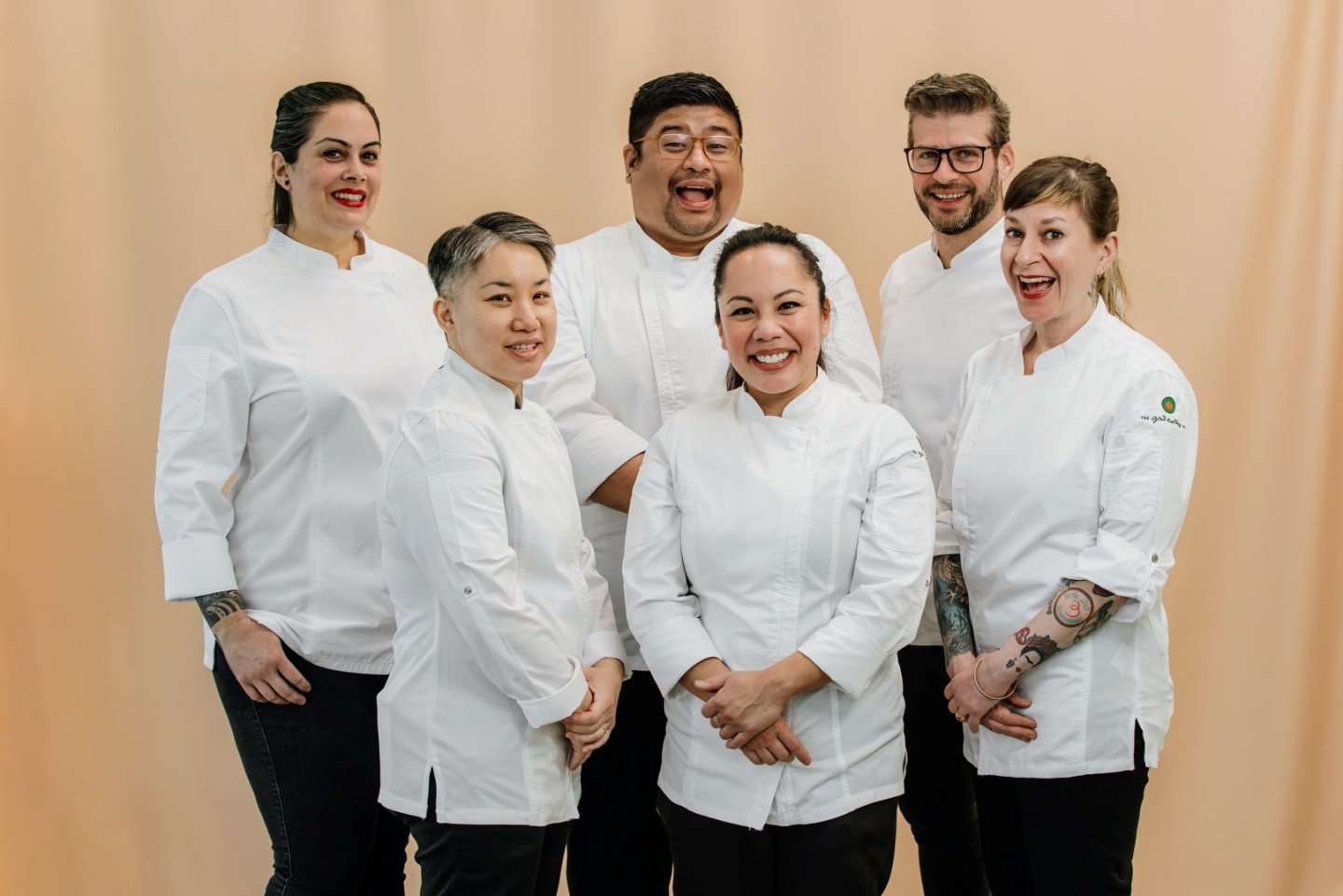 a group of chefs posing for a picture.